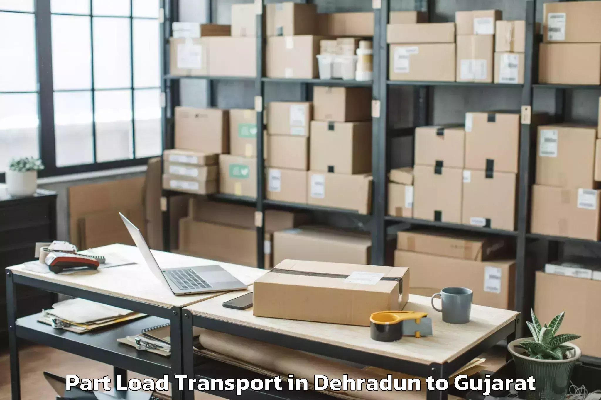 Expert Dehradun to Marwadi University Rajkot Part Load Transport